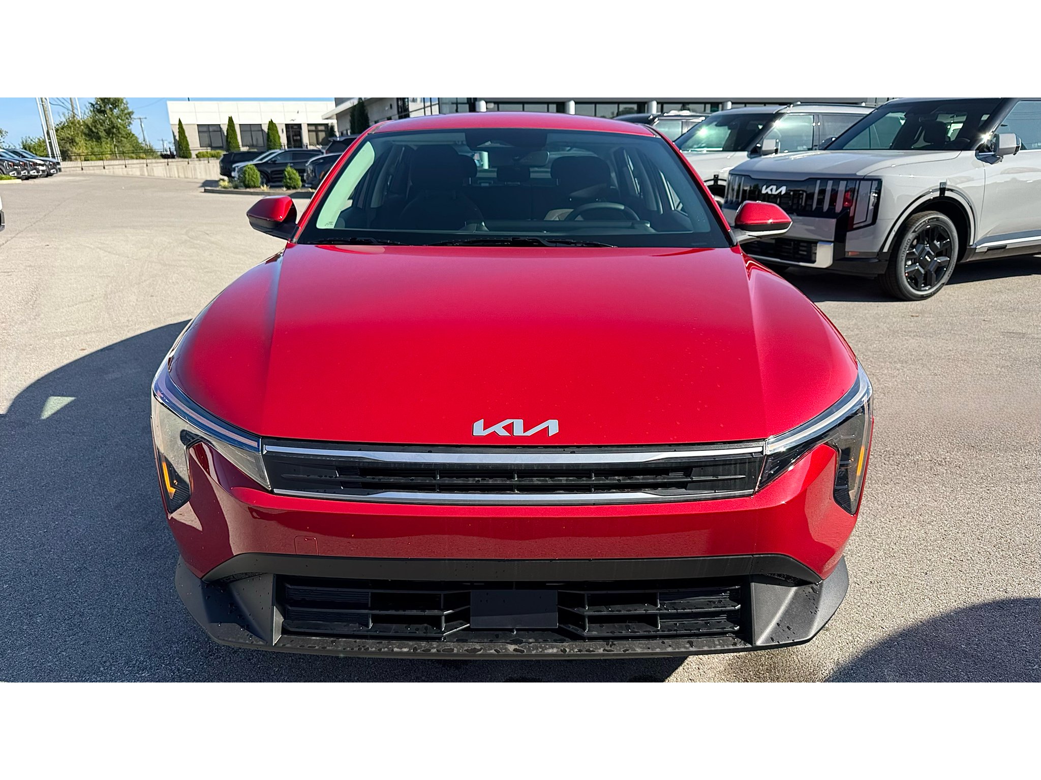 New 2026 Currant Red Kia LXS image 28