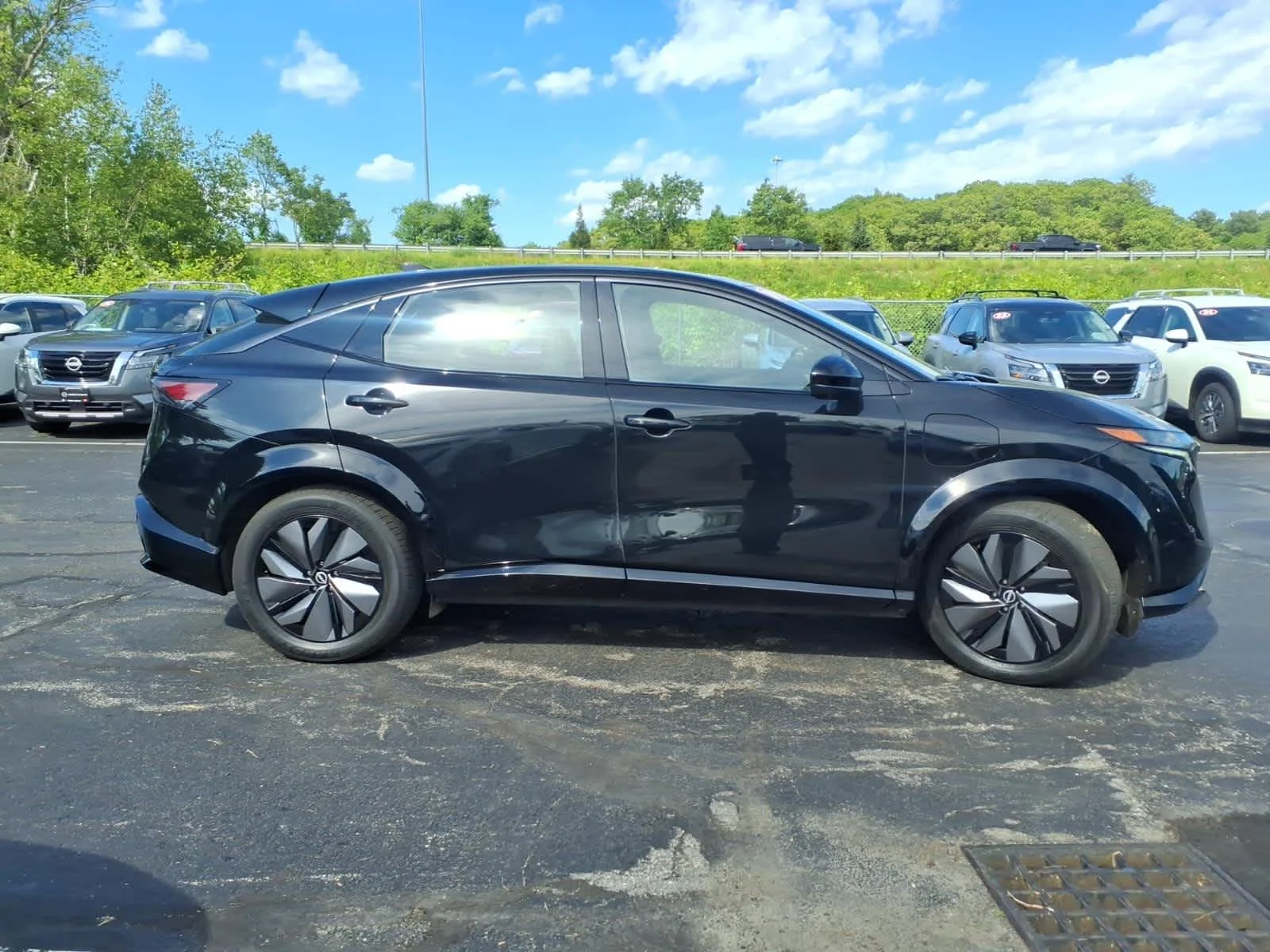 Certified Used 2024 Black Diamond Pearl Nissan EVOLVE+ image 4