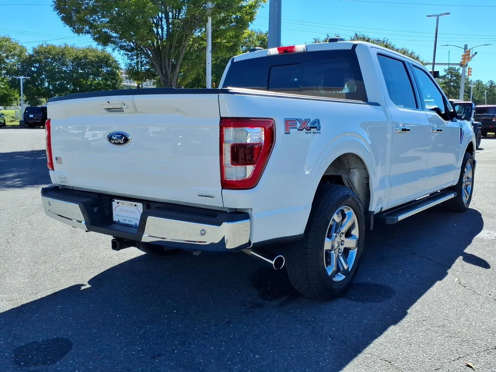 Used 2021 Star White Metallic Tri-Coat Ford LARIAT image 2