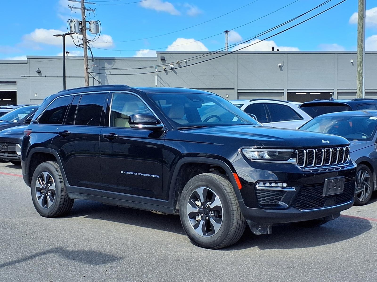 Used 2024 Diamond Black Crystal Pearl Coat Jeep 4xe image 1