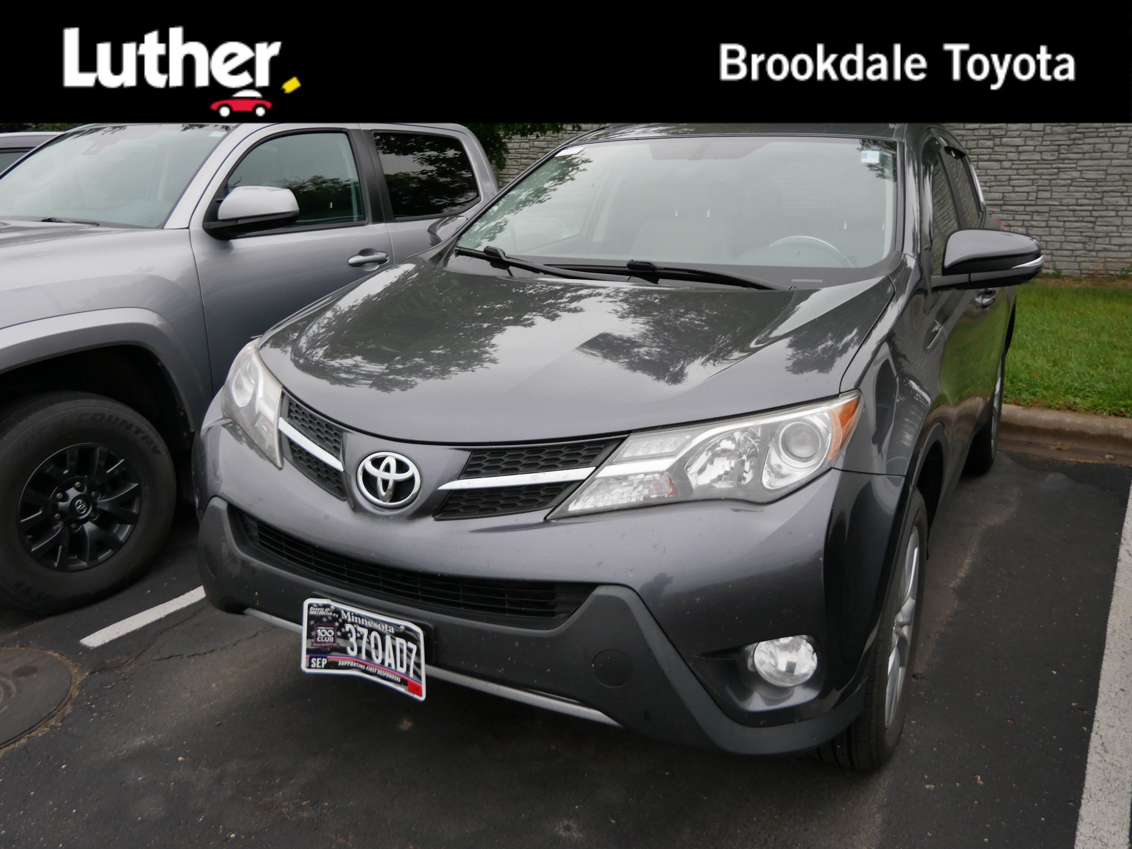 Used 2015 Magnetic Gray Metallic Toyota Limited image 1