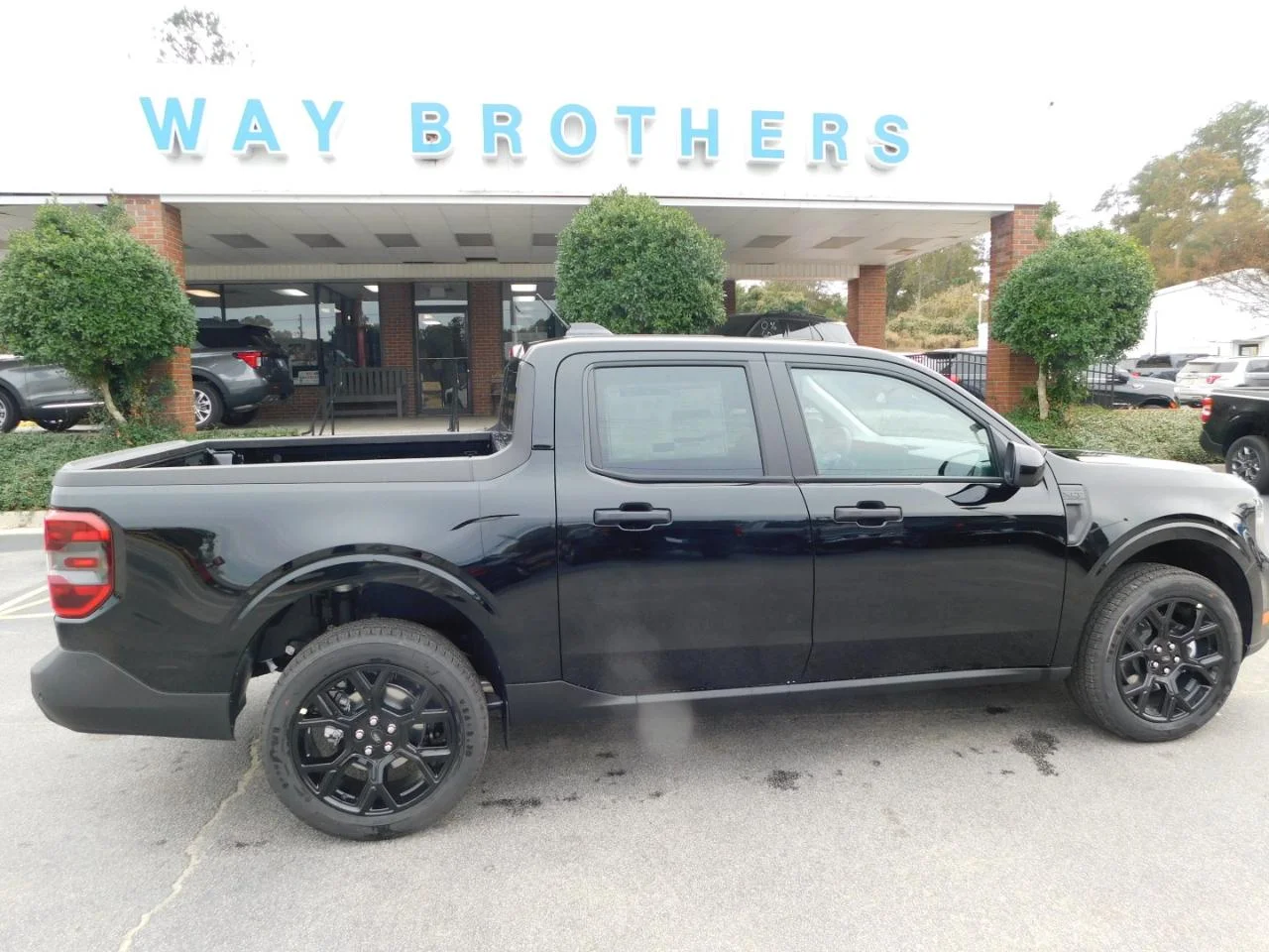 New 2025 Shadow Black Ford XLT image 1