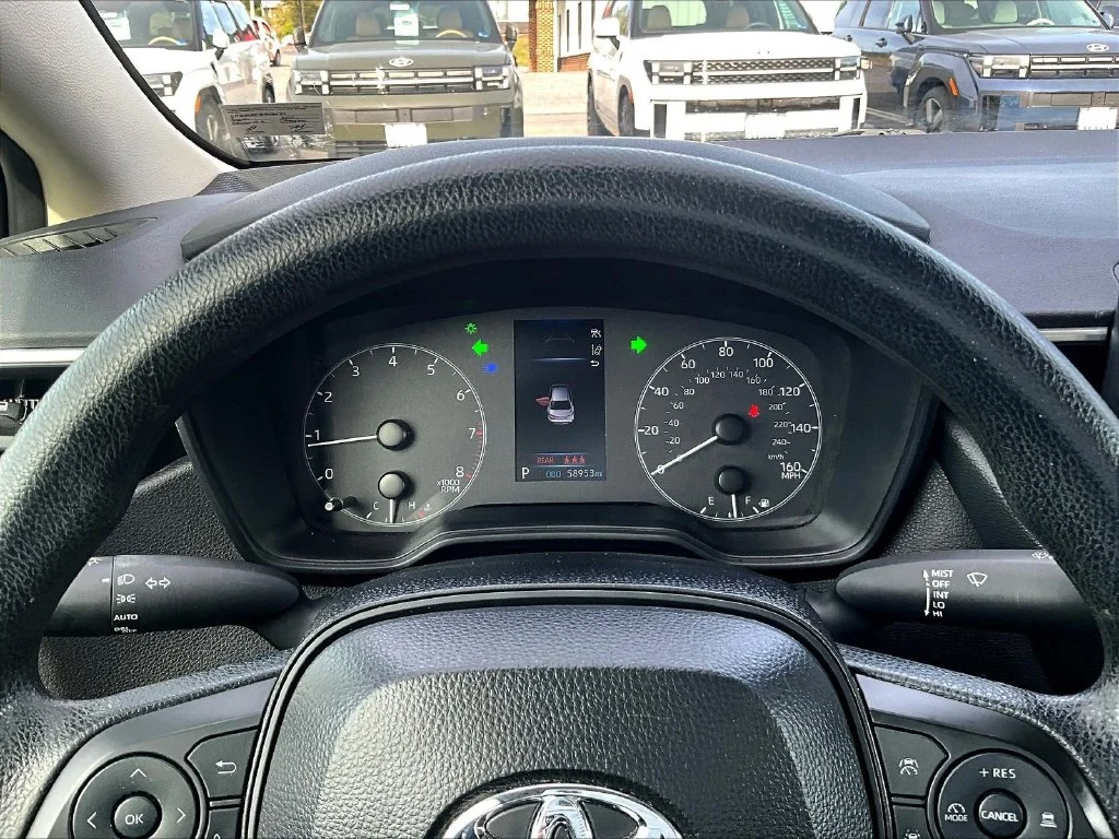 Used 2024 Black Toyota LE image 14