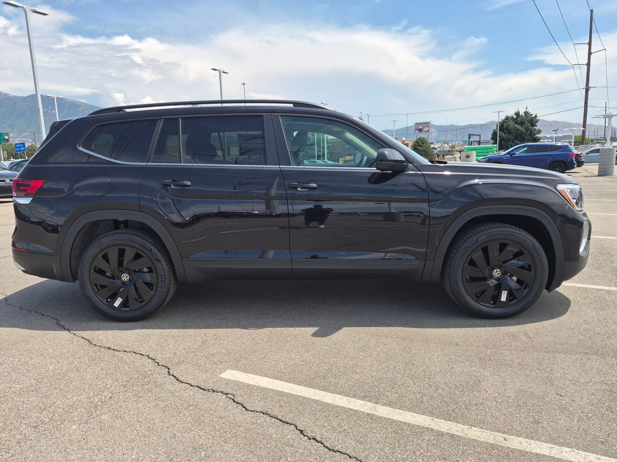New 2026 Deep Black Pearl Volkswagen 2.0T SE w/Technology image 2