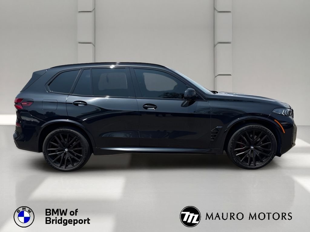 Certified Used 2024 Black BMW xDrive40i image 2