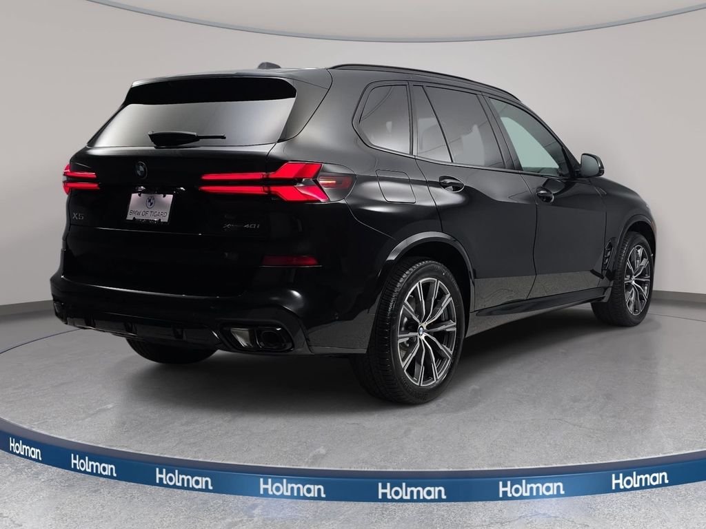 New 2026 Black Sapphire Metallic BMW xDrive40i image 5
