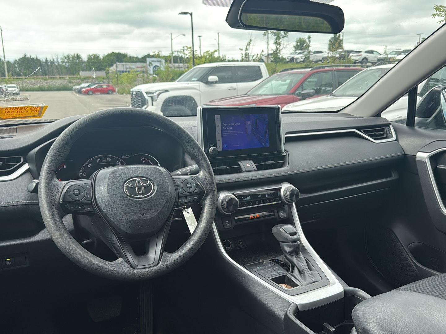Used 2024 Magnetic Gray Metallic Toyota LE image 7