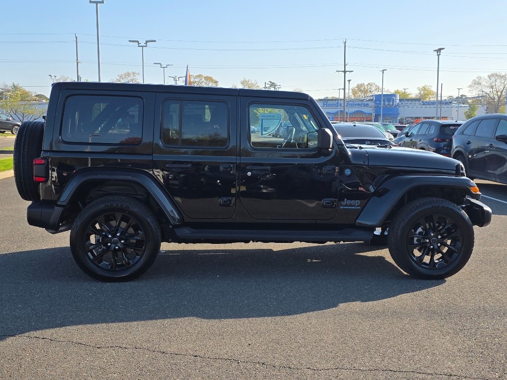 Used 2025 Black Clear Coat Jeep Sahara 4xe image 18