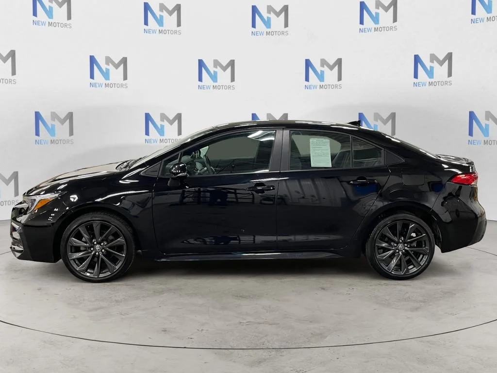 Used 2025 Midnight Black Metallic Toyota SE image 2