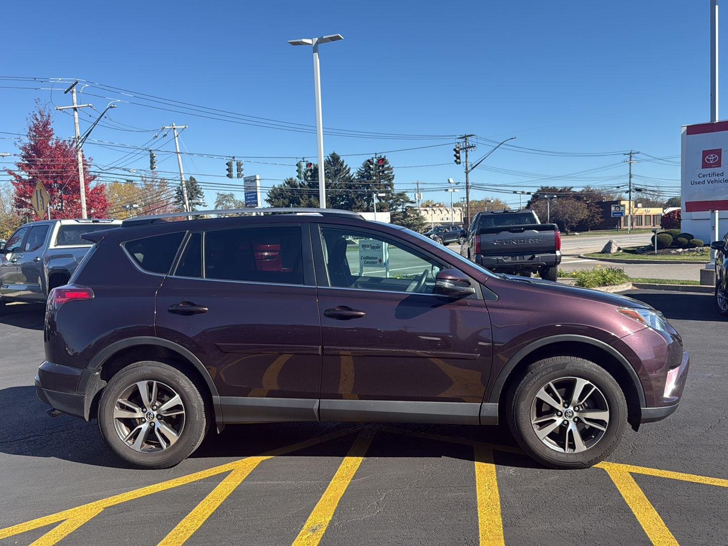 Used 2017 Black Currant Metallic Toyota XLE image 2
