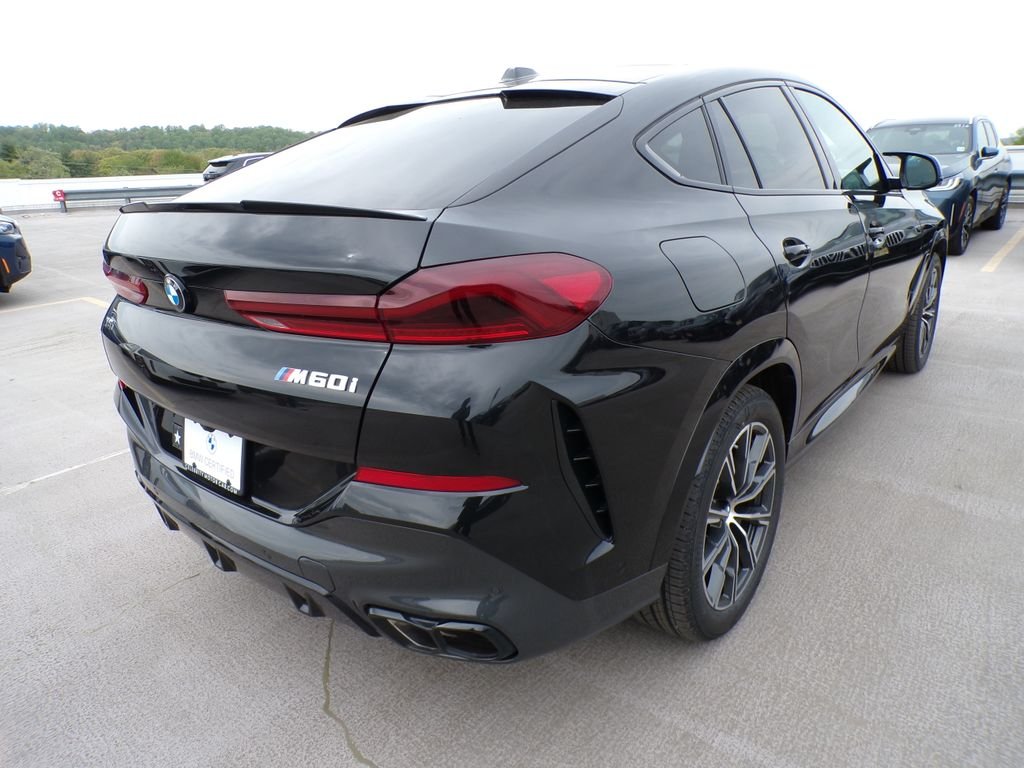 Certified Used 2024 Black Sapphire Metallic BMW M60i image 6