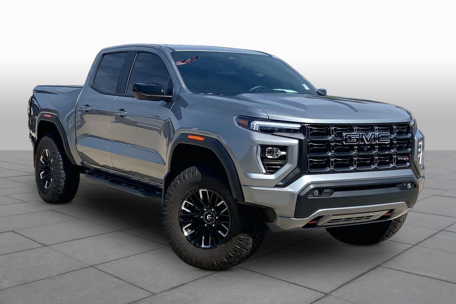 Used 2025 Sterling Metallic GMC 4WD AT4 image 3