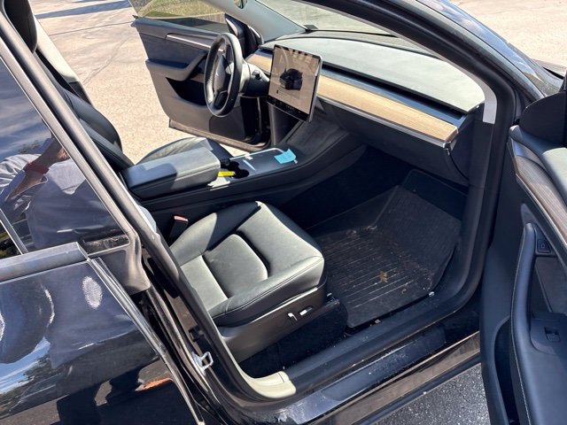 Used 2023 Solid Black Tesla Performance image 16