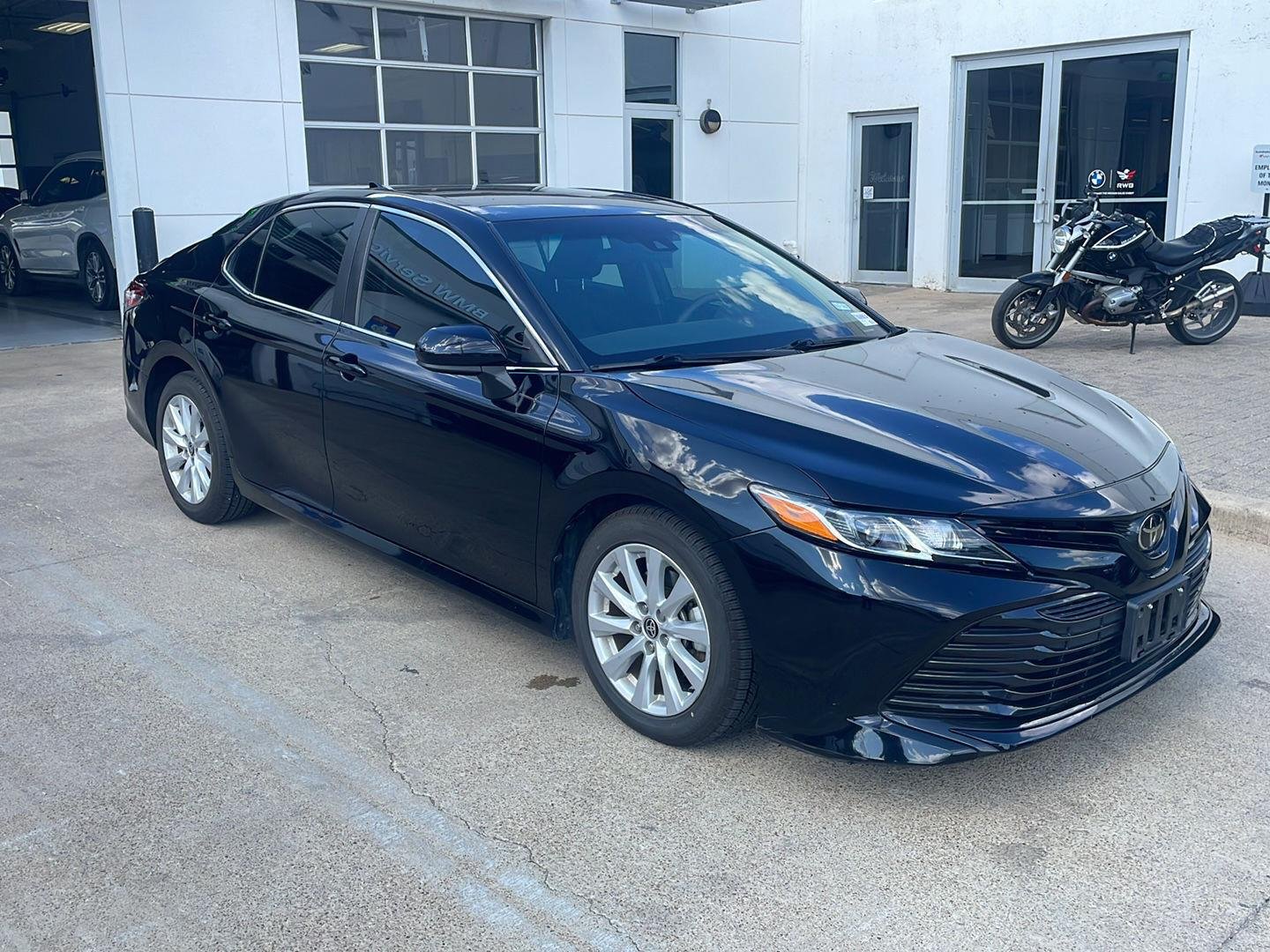 Used 2020 Midnight Black Metallic Toyota LE image 2