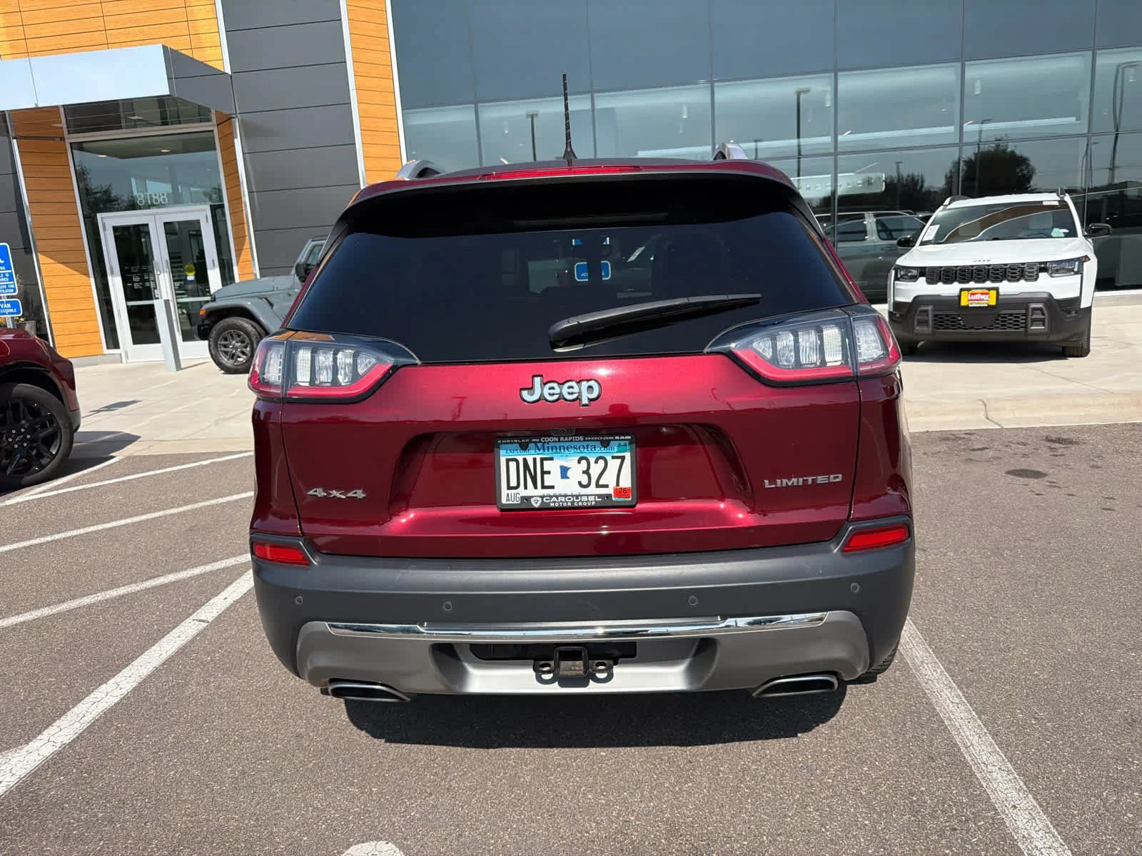 Used 2019 Velvet Red Pearlcoat Jeep Limited image 4