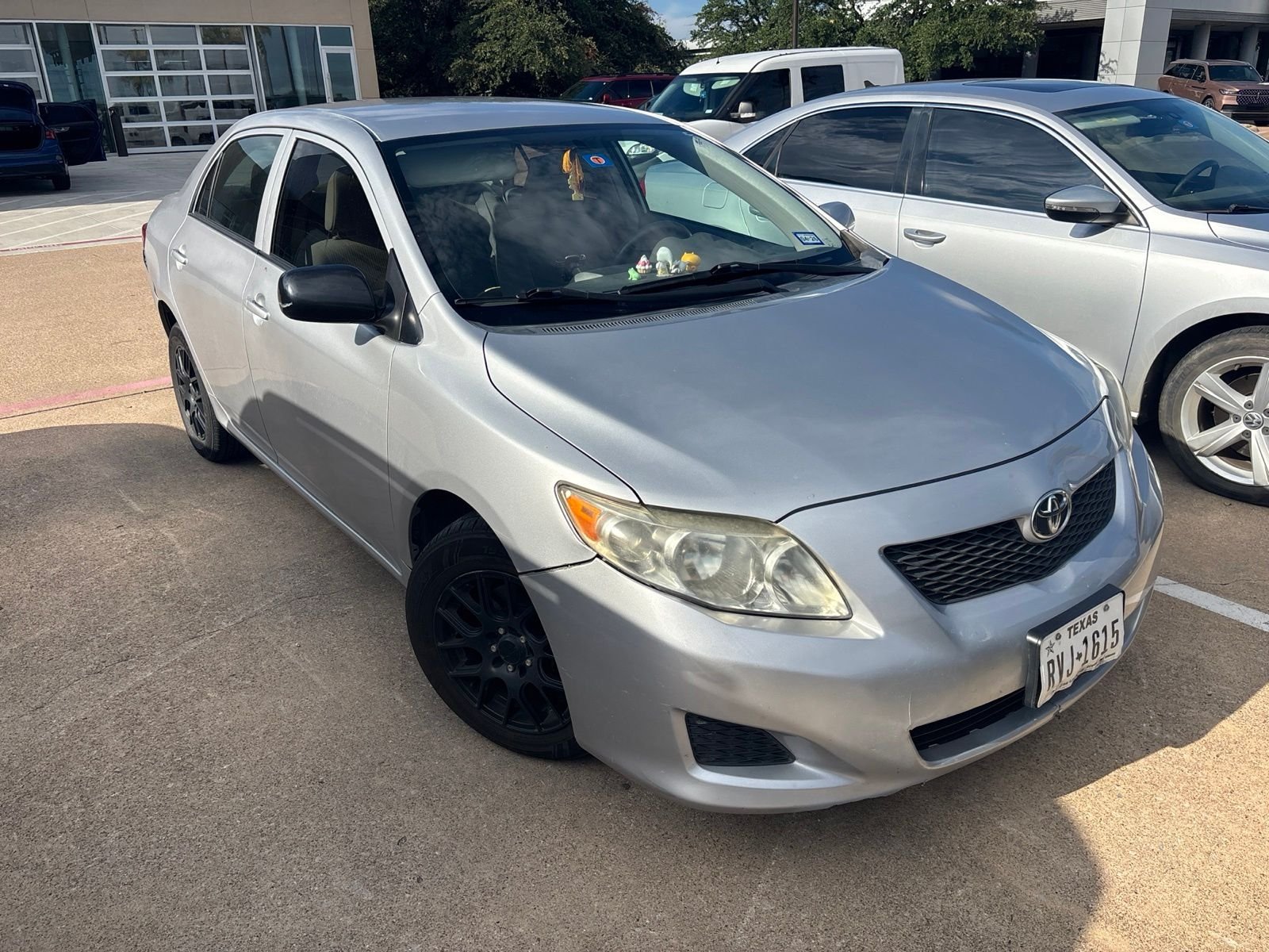 Used 2010 Classic Silver Metallic Toyota LE image 3