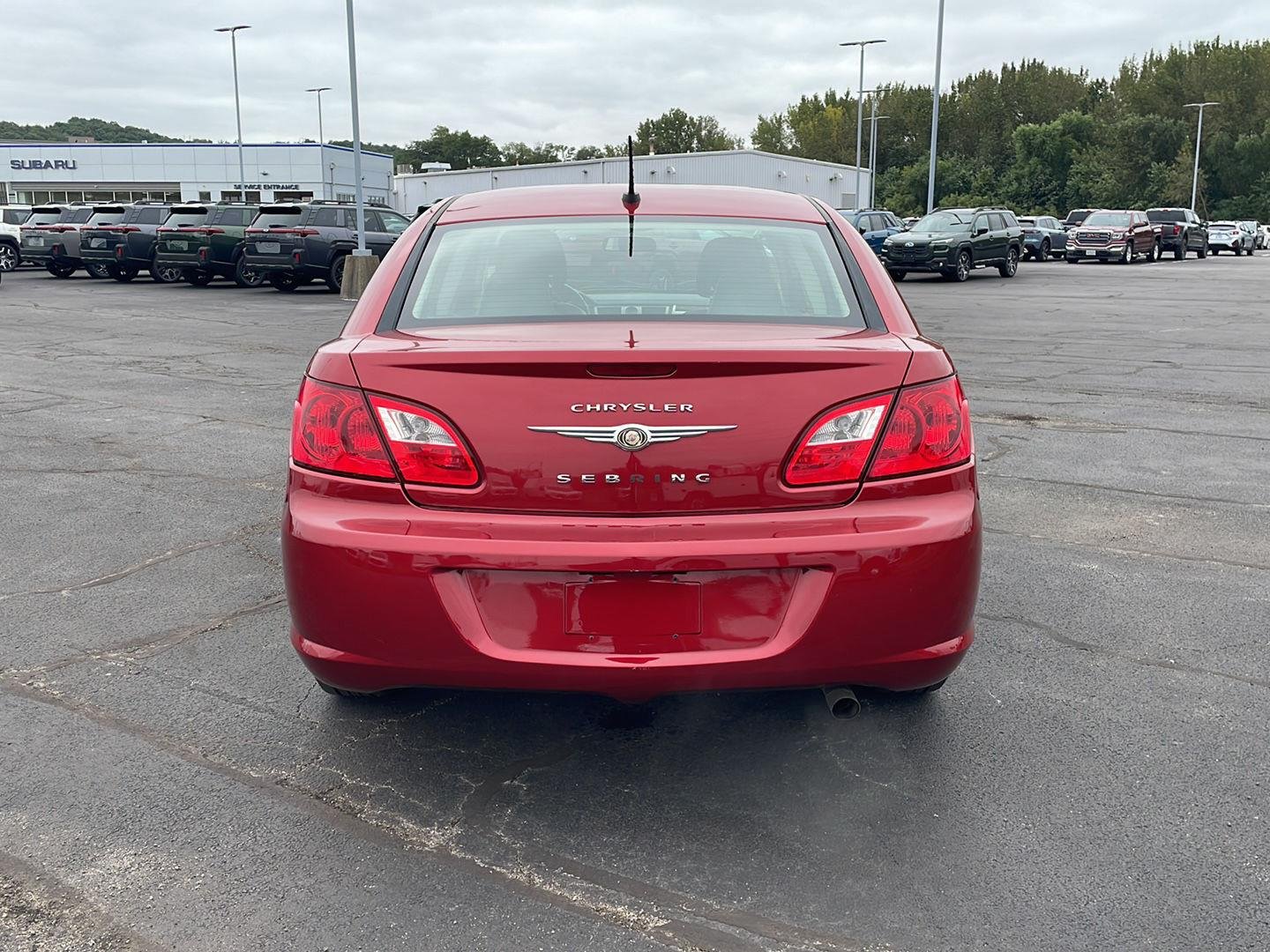 Used 2010 Inferno Red Crystal Pearl Chrysler Limited image 4