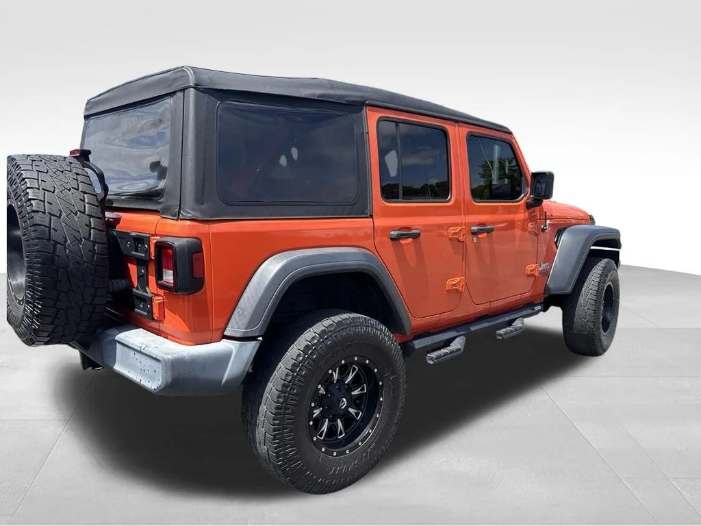 Used 2019 Orange Jeep Unlimited Sport image 13