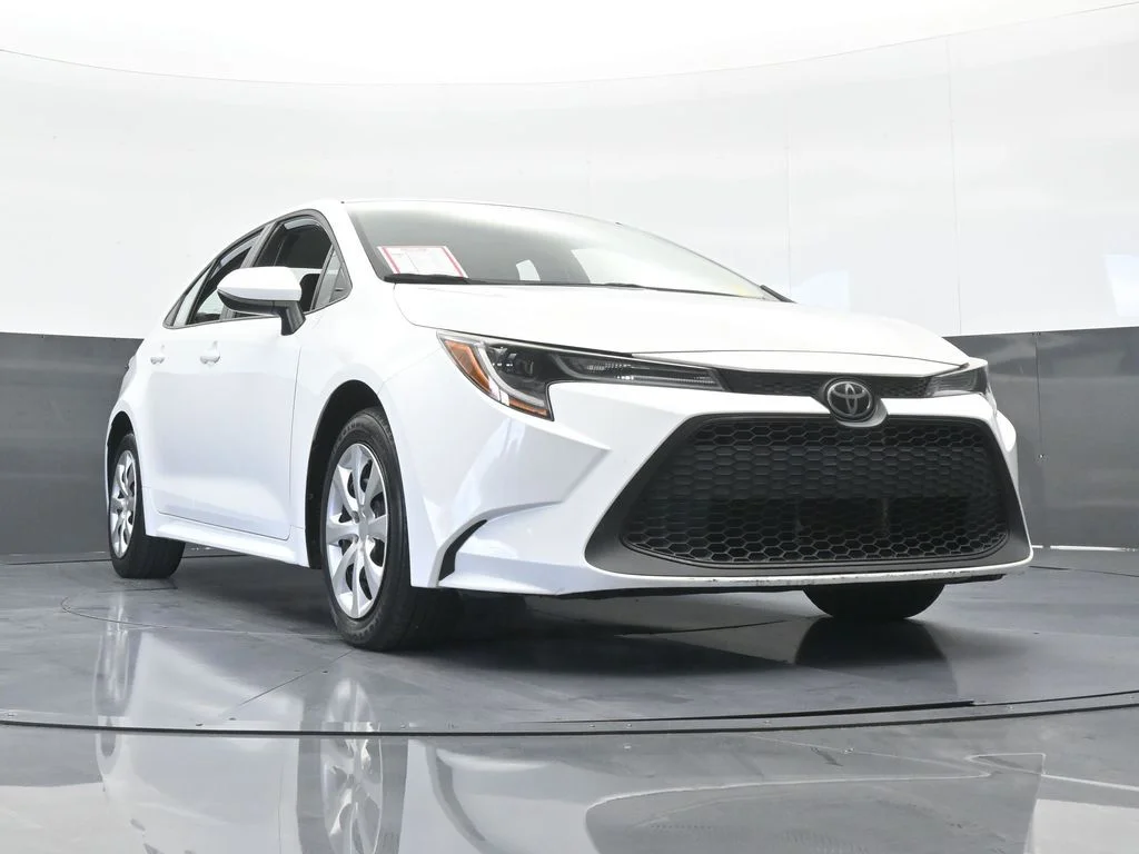 Used 2021 Super White Toyota LE image 52