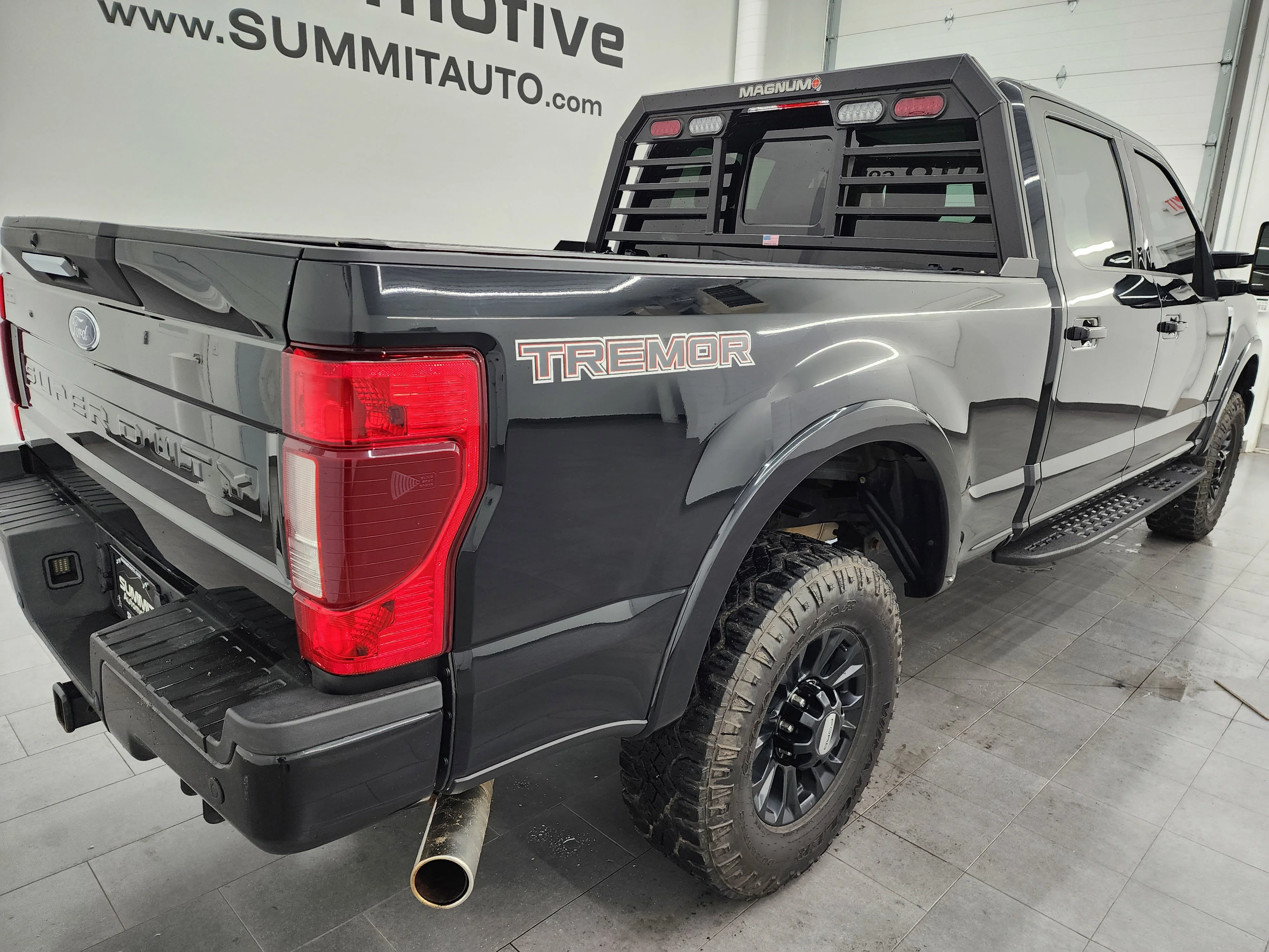 Used 2022 Agate Black Metallic Ford Lariat image 4