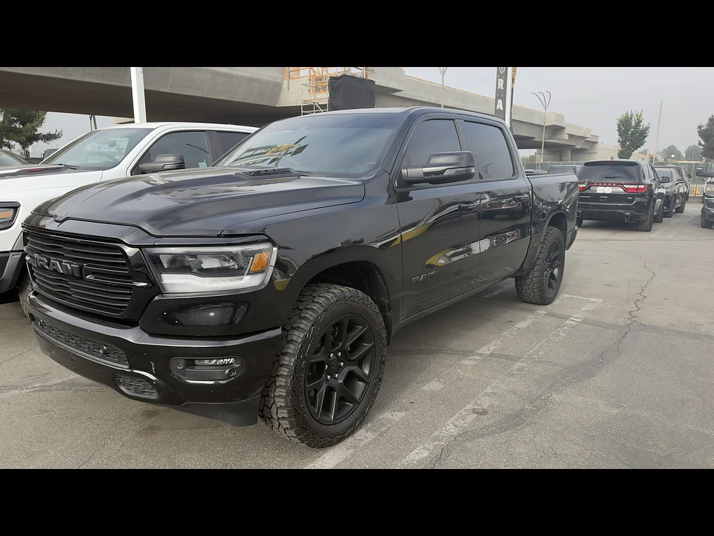 Used 2024 Diamond Black Crystal Pearl Coat Ram Laramie image 2