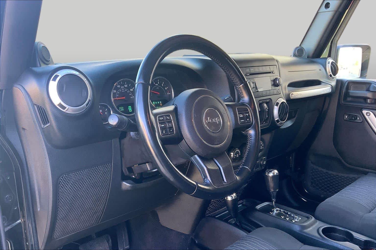 Used 2012 Black Jeep Sahara image 17
