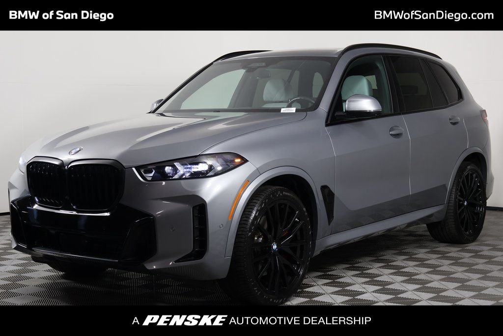 Certified Used 2024 Skyscraper Grey Metallic BMW xDrive40i image 1