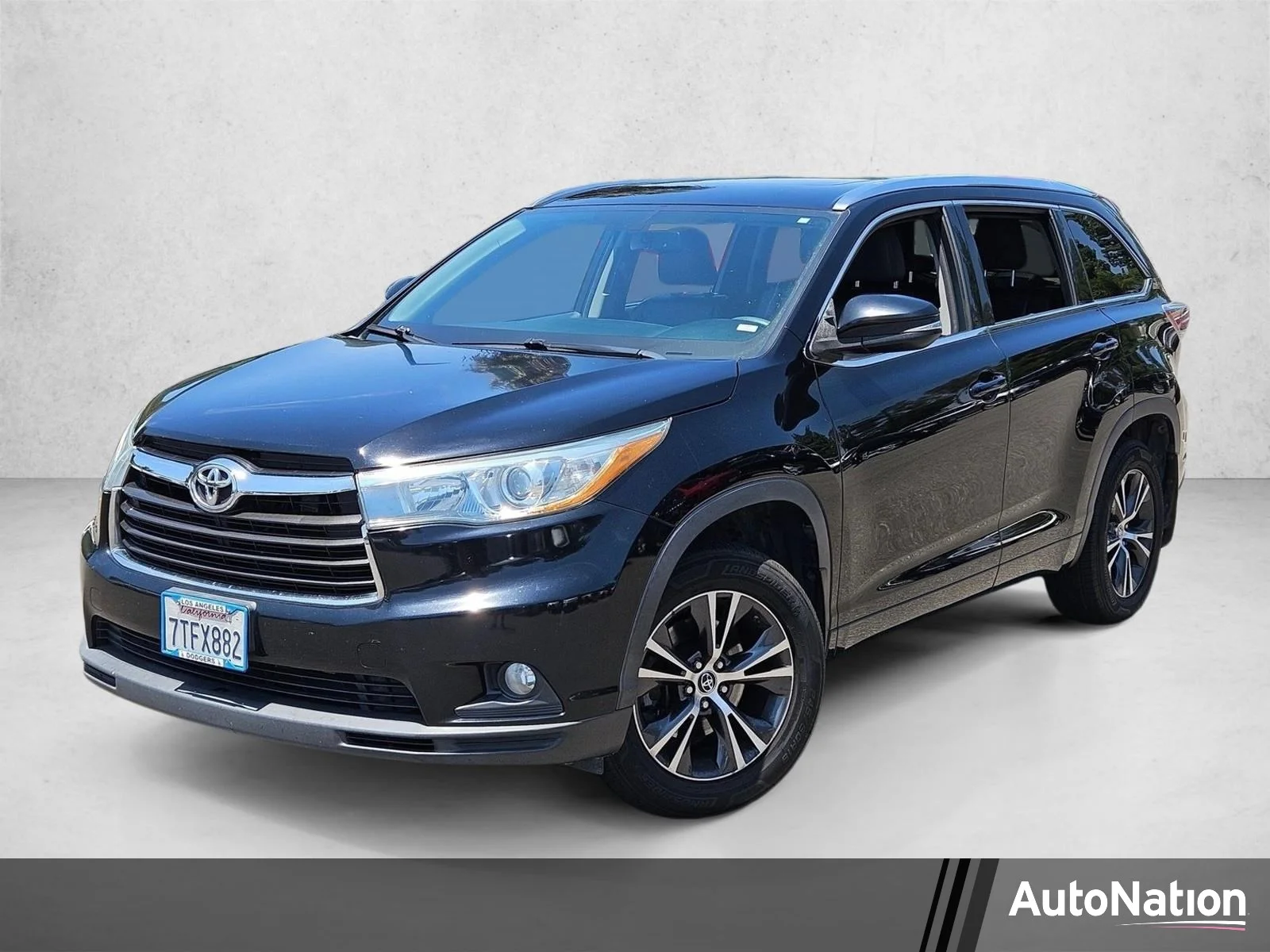 Used 2016 Midnight Black Metallic Toyota XLE image 1
