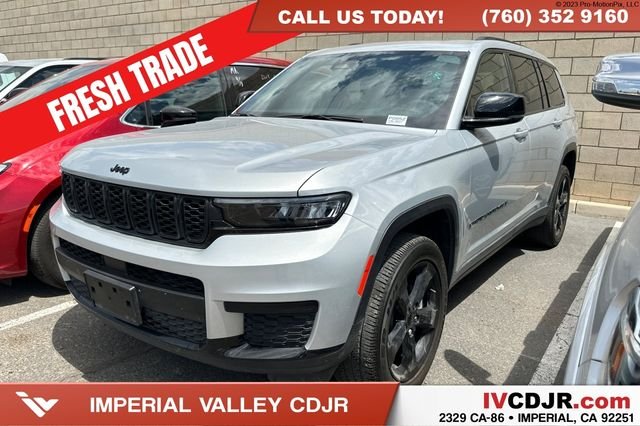 Certified Used 2023 Silver Jeep Altitude image 1