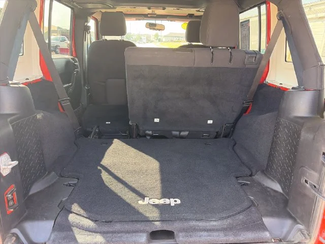 Used 2015 Orange Jeep Unlimited Sport image 29