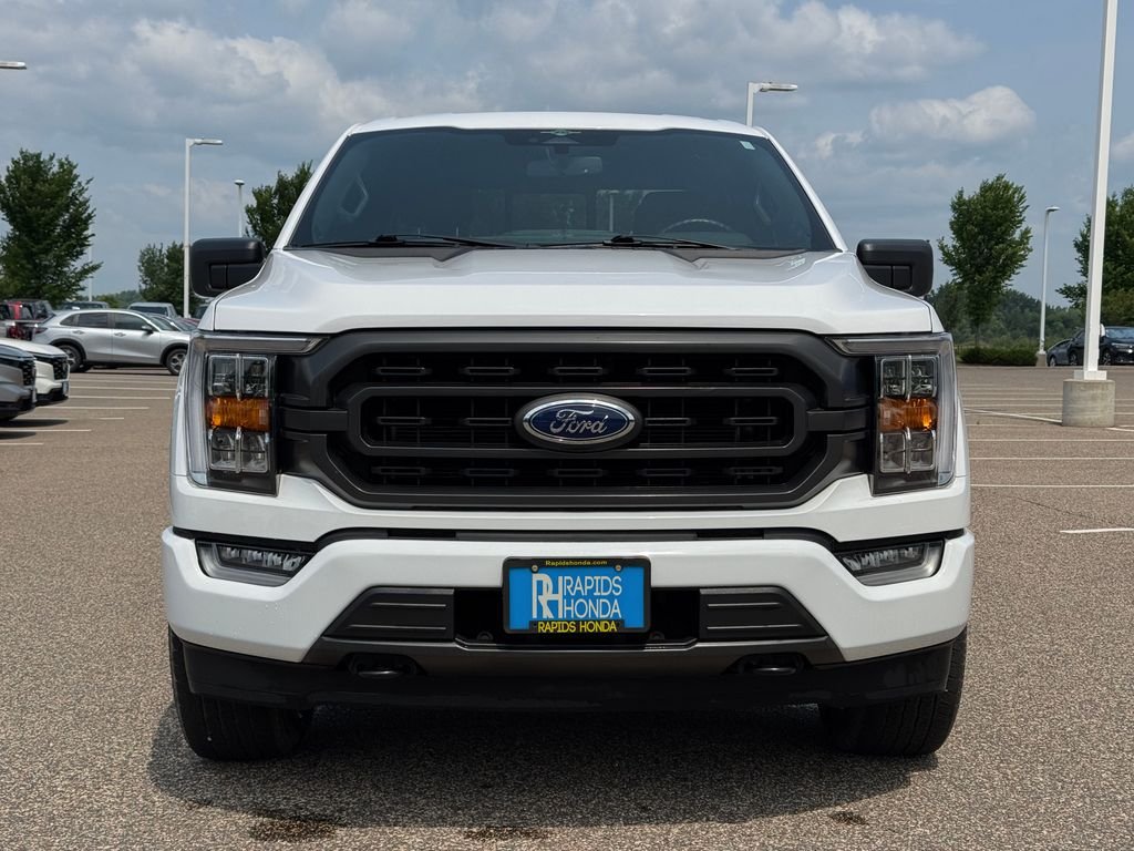 Used 2023 Ford F-150 XLT with VIN 1FTFW1E56PKD21073 for sale in Coon Rapids, Minnesota