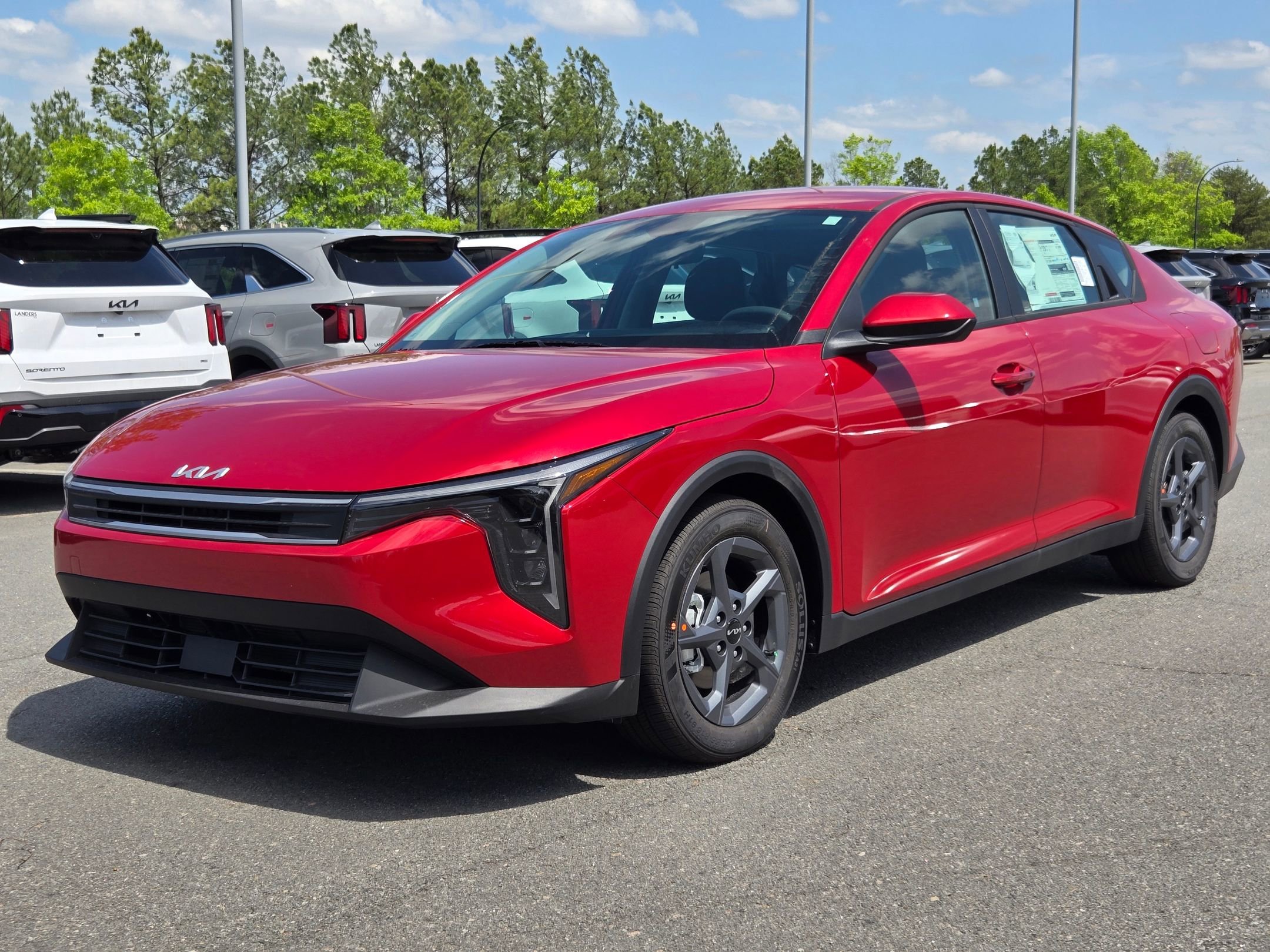 New 2026 Currant Red Kia LXS image 3