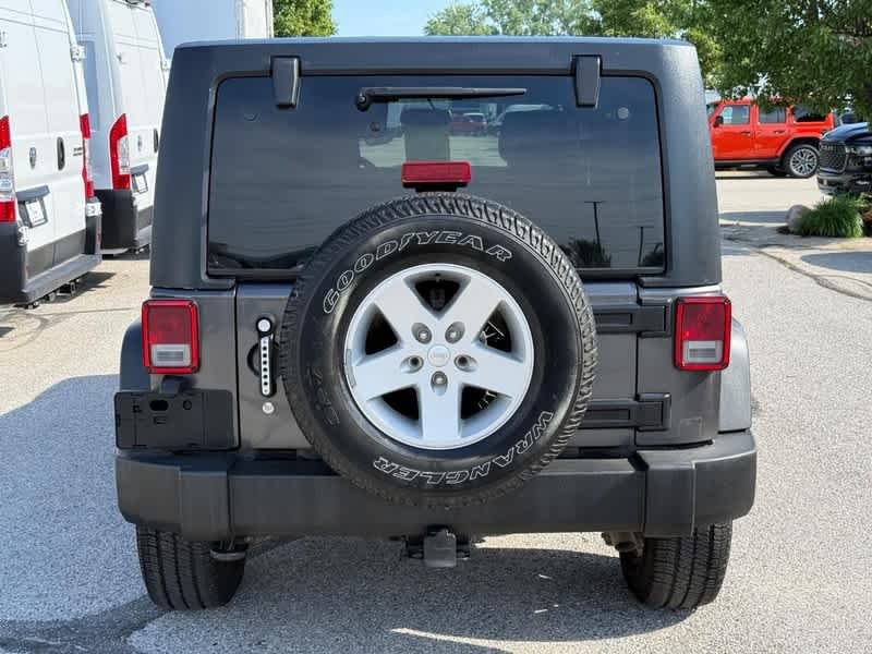 Used 2018 Granite Crystal Metallic Clearcoat Jeep Sport S image 4