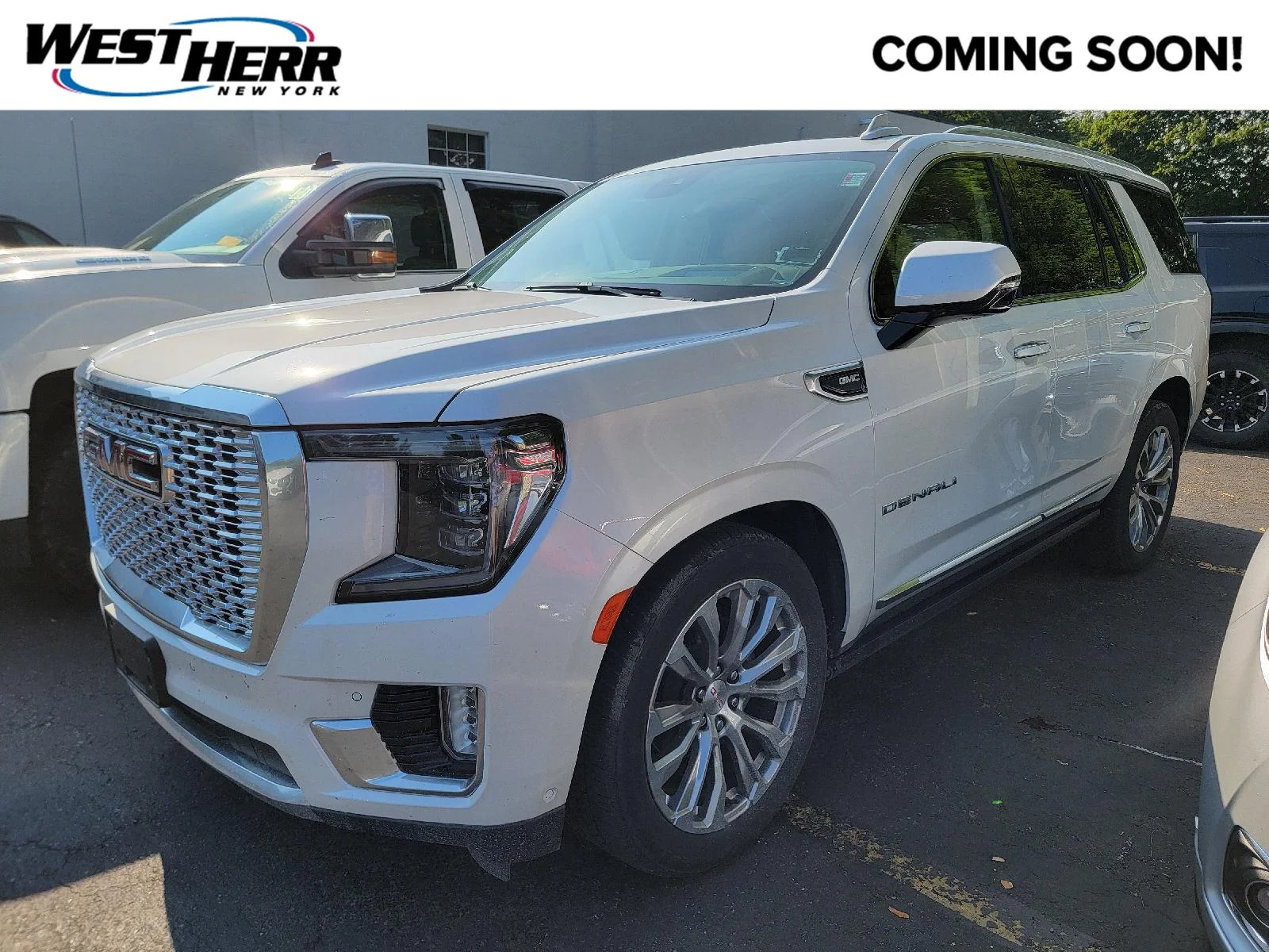 Used 2024 White Frost Tricoat GMC Denali image 1