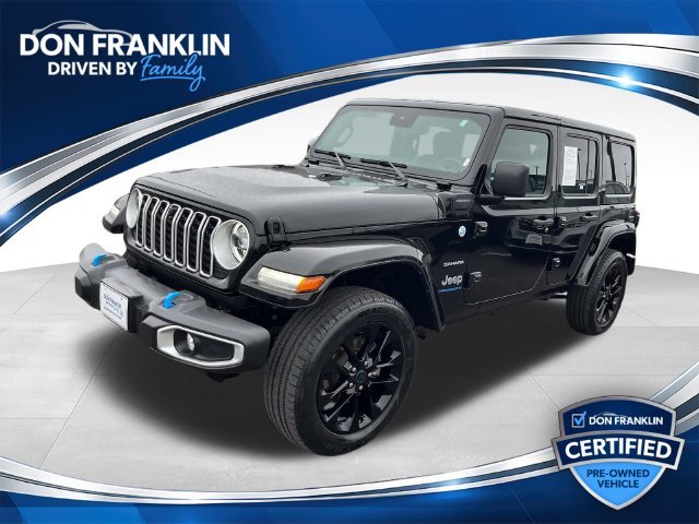Used 2024 Black Jeep Sahara 4xe image 1