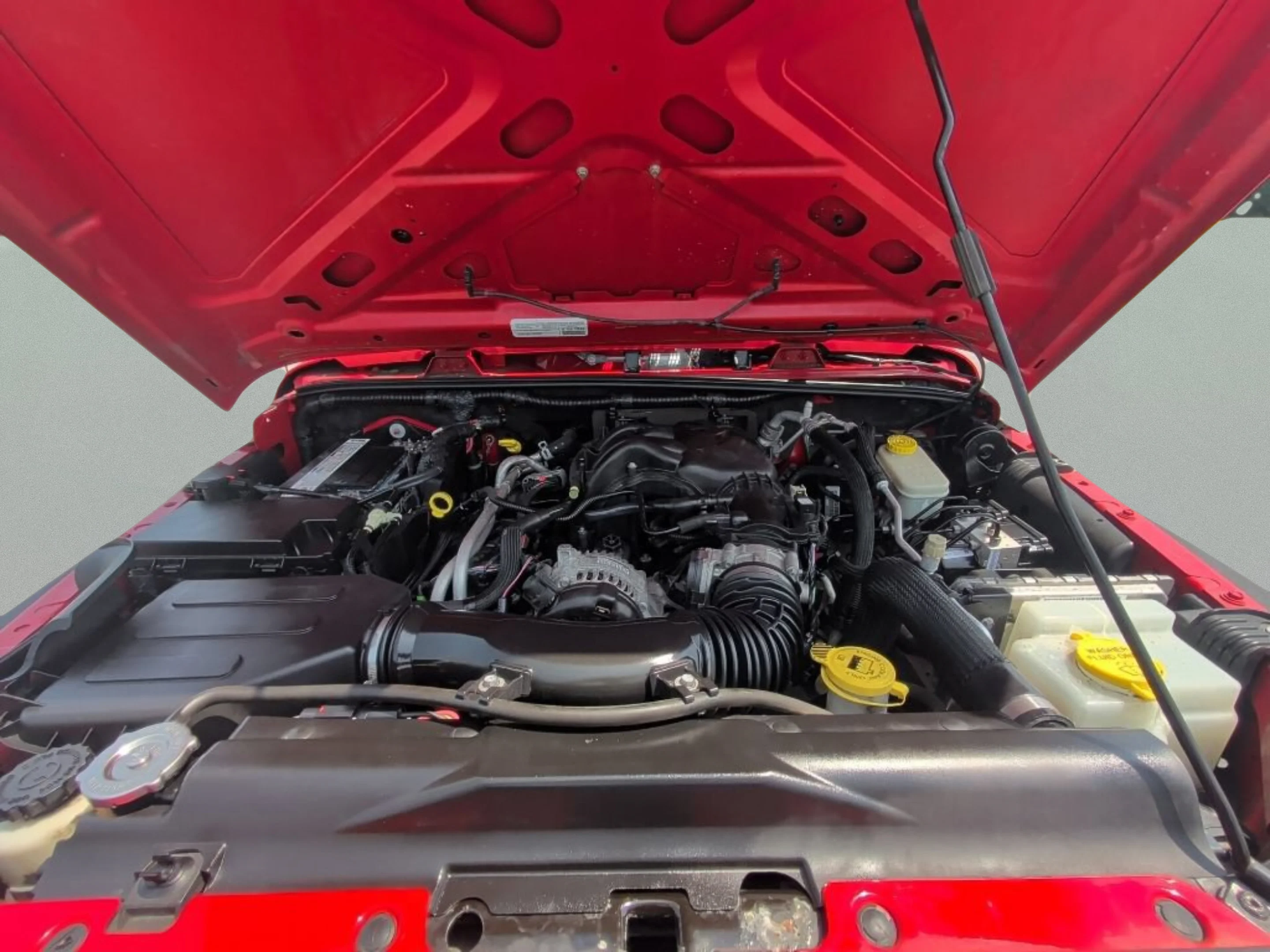 Used 2015 Firecracker Red Clear Coat Jeep Sport image 10