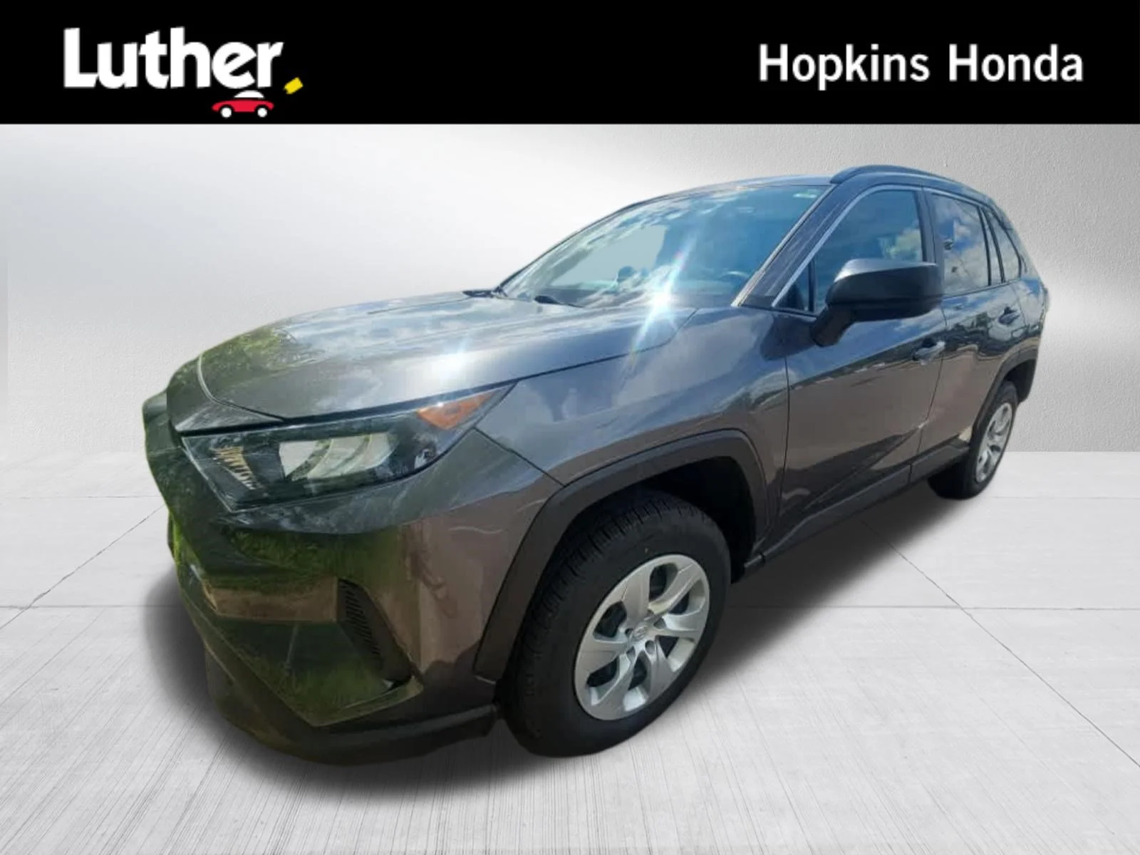 Used 2021 Magnetic Gray Metallic Toyota LE image 1