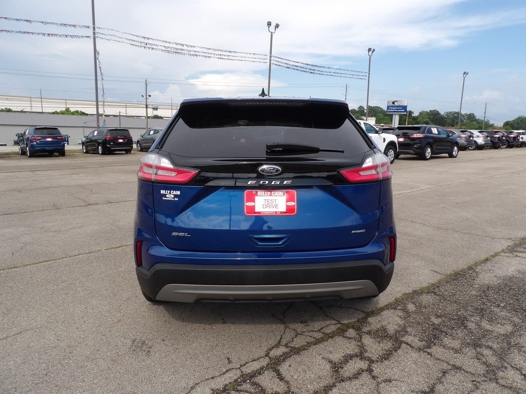 Used 2024 Blue Metallic Ford SEL image 7