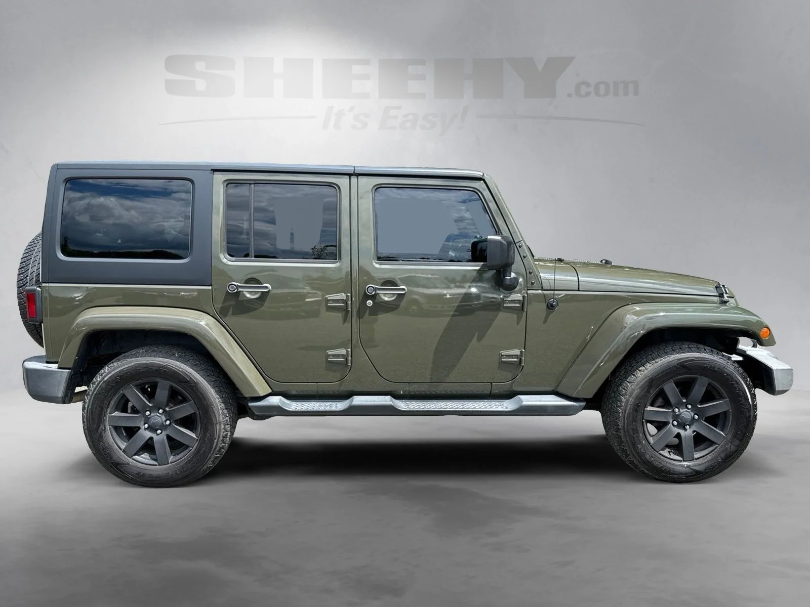 Used 2015 Green Jeep Unlimited Sahara image 8