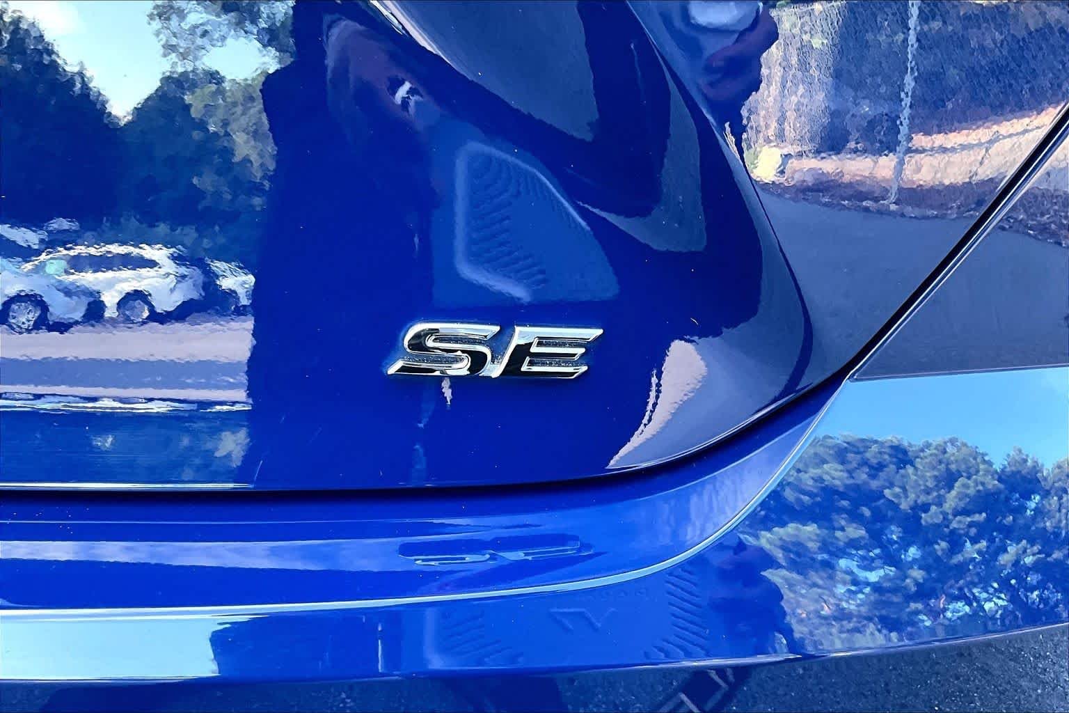 Used 2025 Reservoir Blue Toyota SE image 10