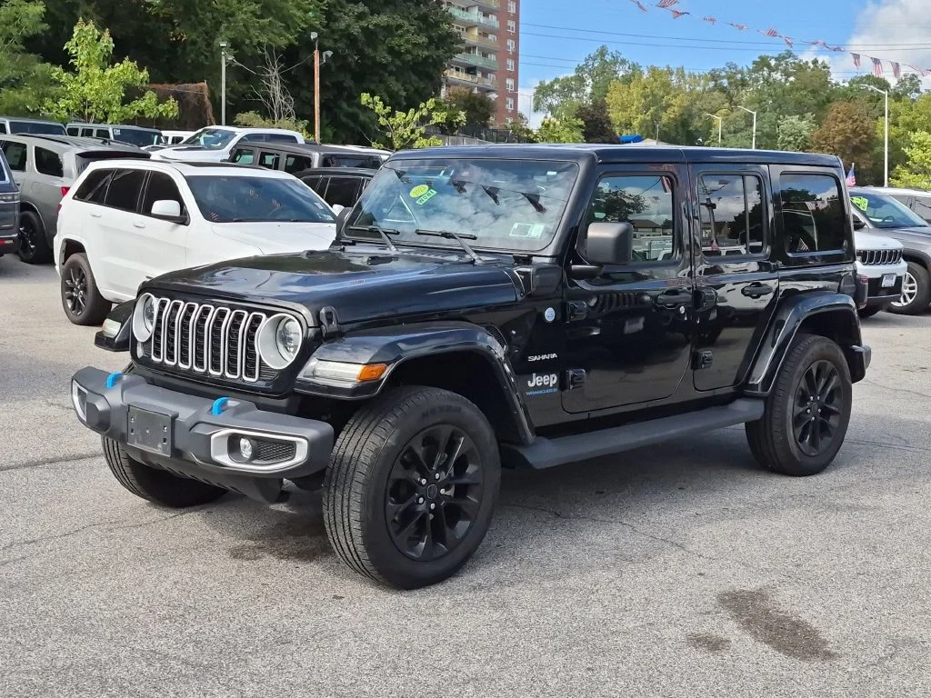 Used 2024 Black Jeep Sahara 4xe image 1