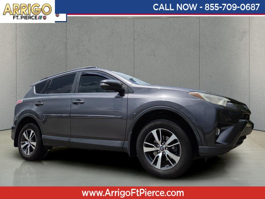 Used 2018 Magnetic Gray Metallic Toyota XLE image 1