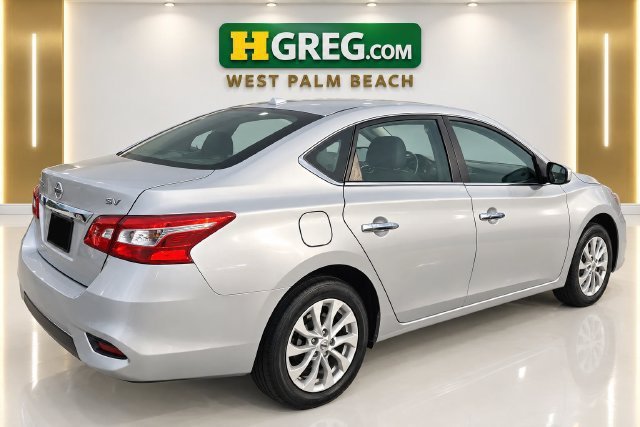 Used 2019 Brilliant Silver Metallic Nissan SV image 4