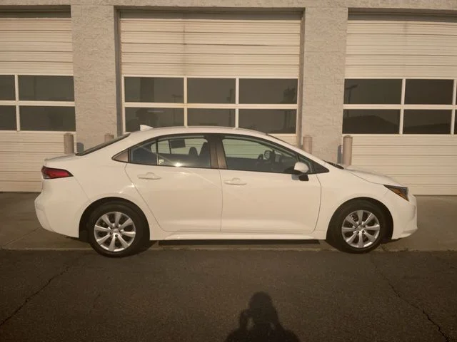 Used 2024 White Toyota LE image 1
