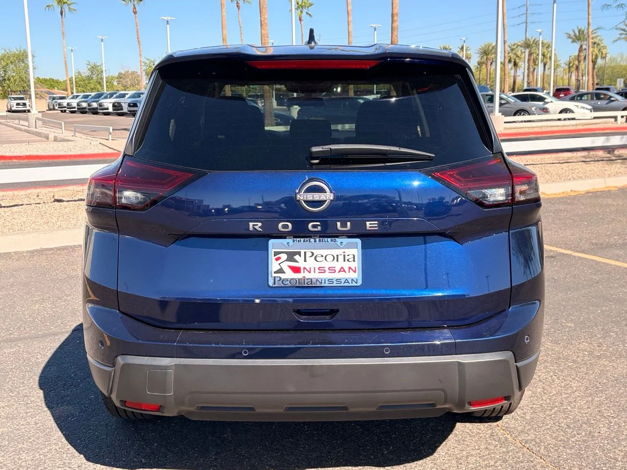 Used 2025 Deep Ocean Blue Pearl Nissan SV image 4