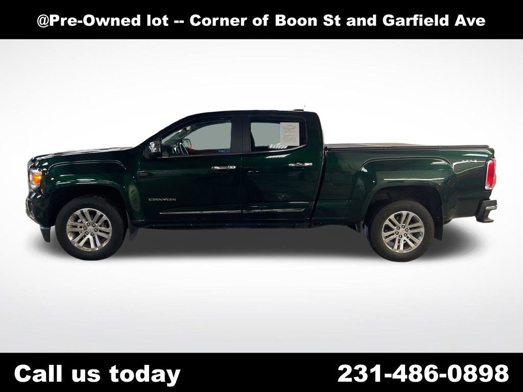 Used 2016 EMERALD GREEN METALLIC GMC 4WD SLT image 2