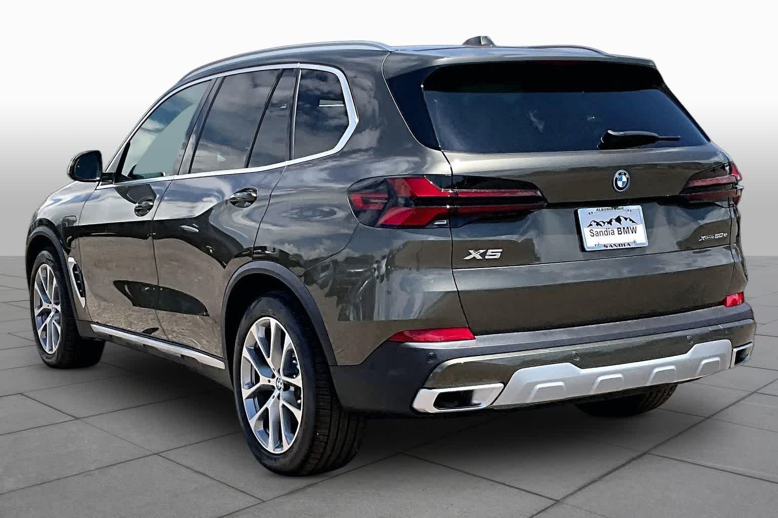 New 2026 Manhattan Green Metallic BMW xDrive50e image 12