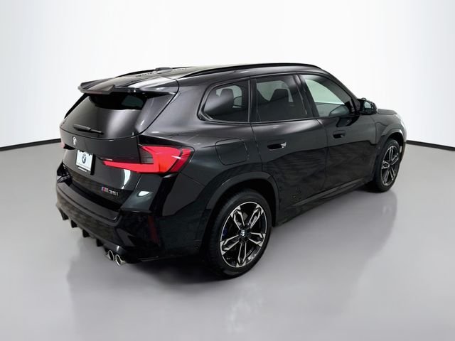 Used 2026 Black Sapphire Metallic BMW M35i image 7