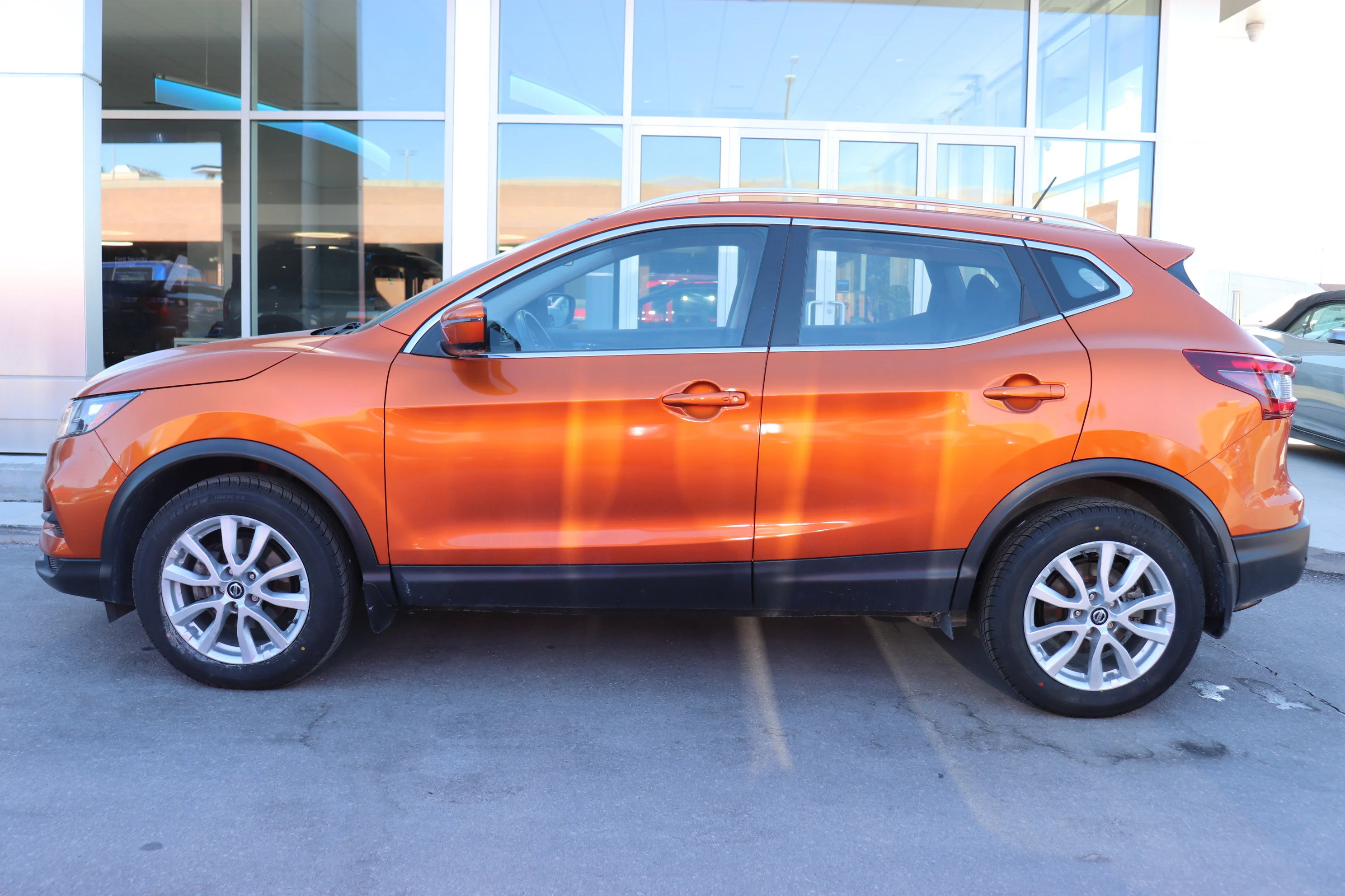 Certified Used 2022 ORANGE Nissan SV image 3