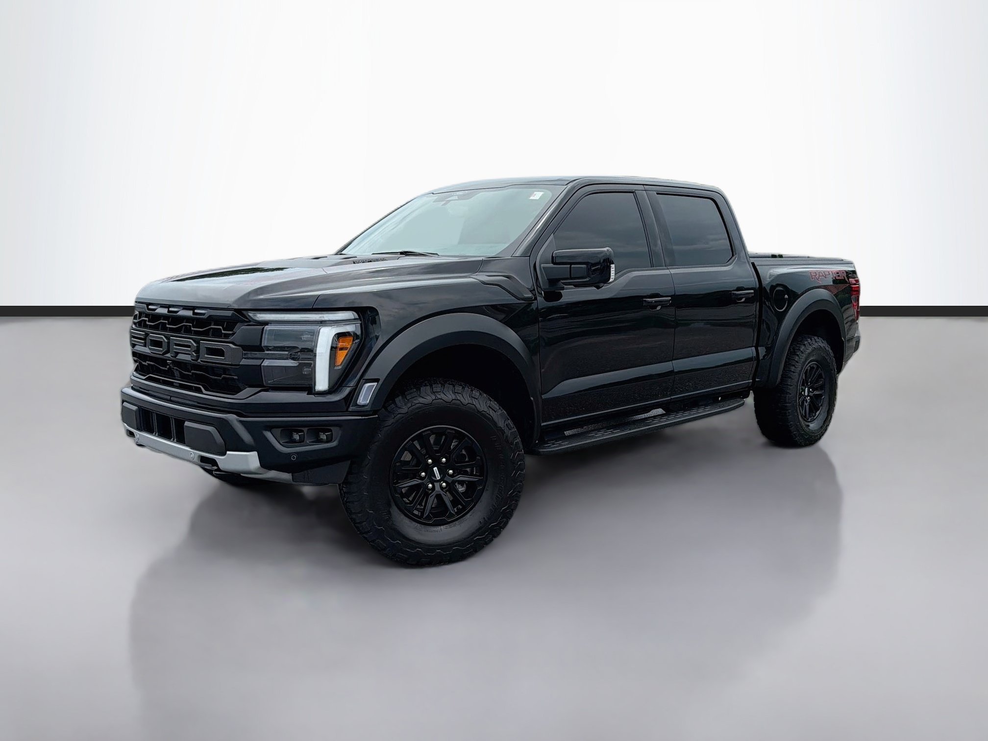 Used 2025 Black Metallic Ford Raptor image 1